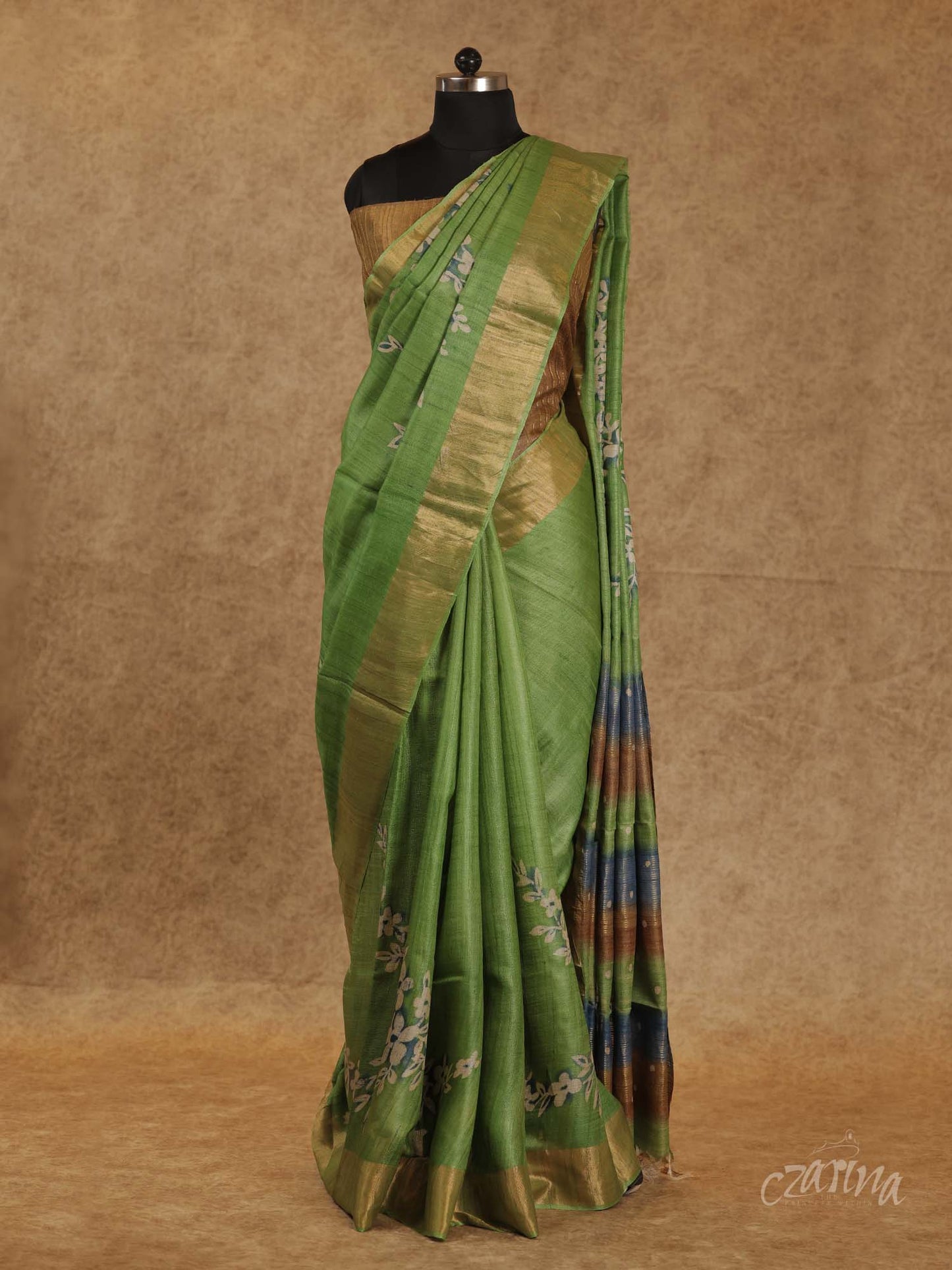 GREEN WITH GOLDEN BORDER AND FLORAL PRINTS TUSSAR SILK SAREE