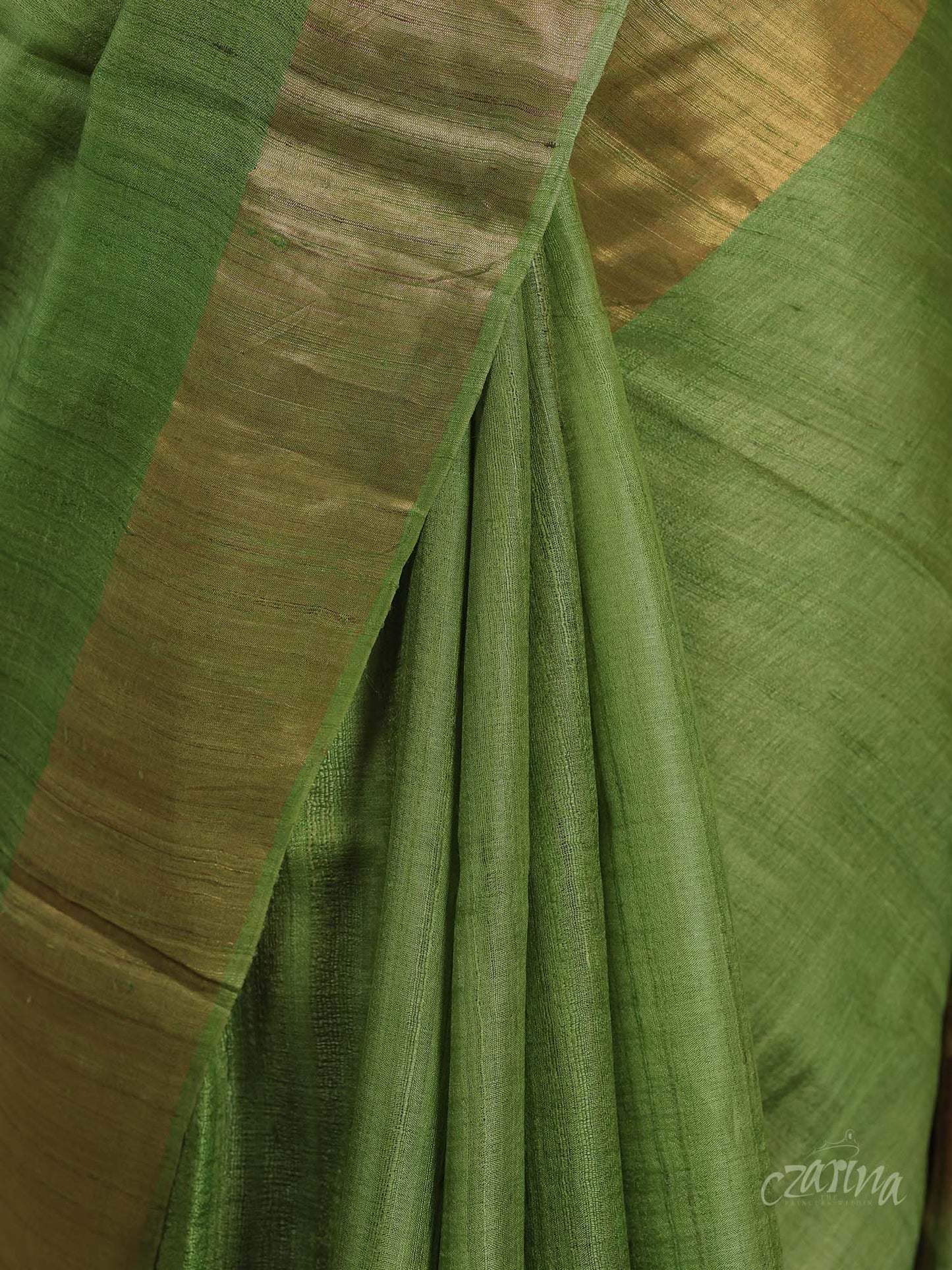 GREEN WITH GOLDEN BORDER AND FLORAL PRINTS TUSSAR SILK SAREE