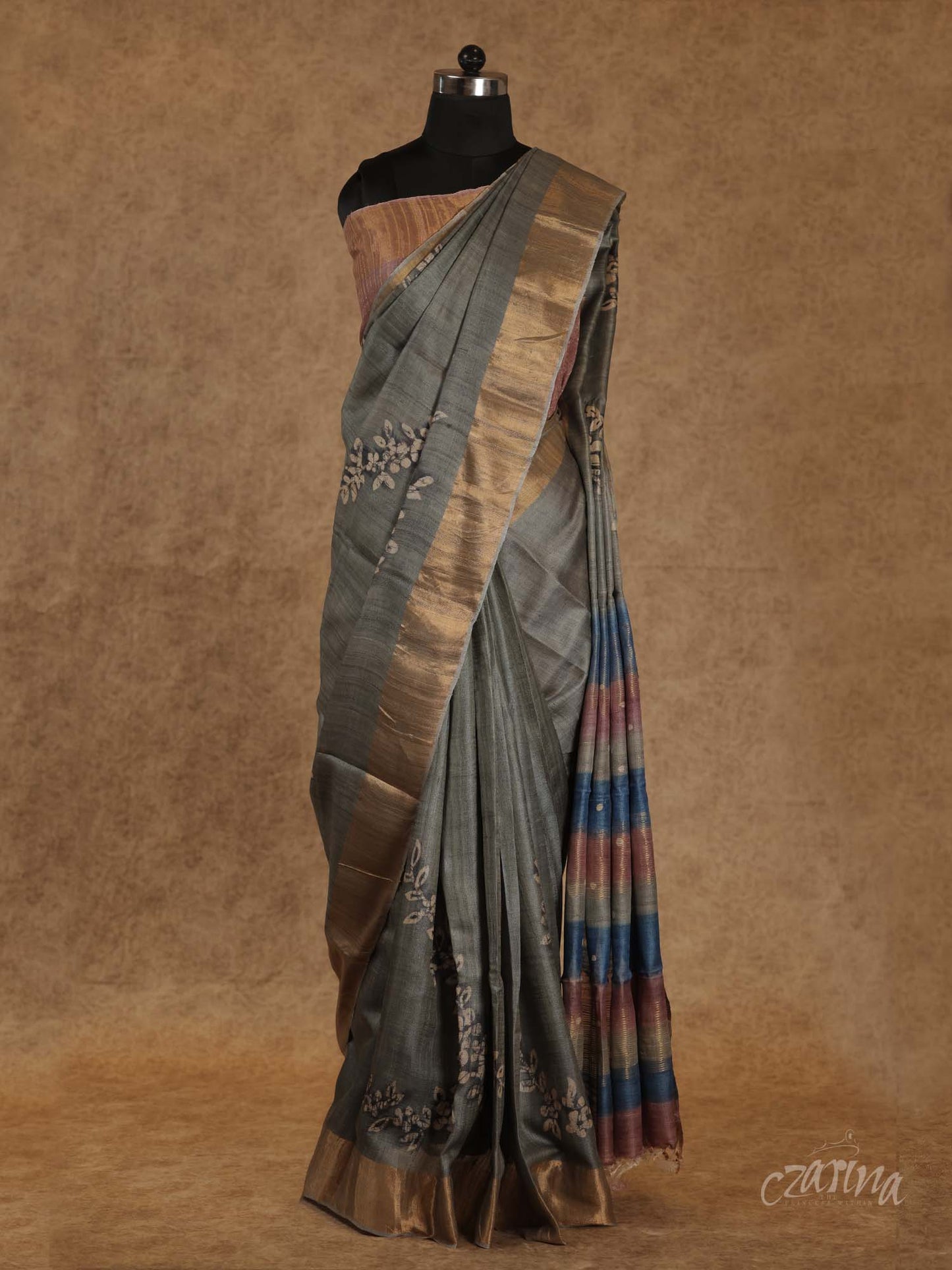 GREY WITH GOLDEN BORDER AND FLORAL PRINTS TUSSAR SILK SAREE