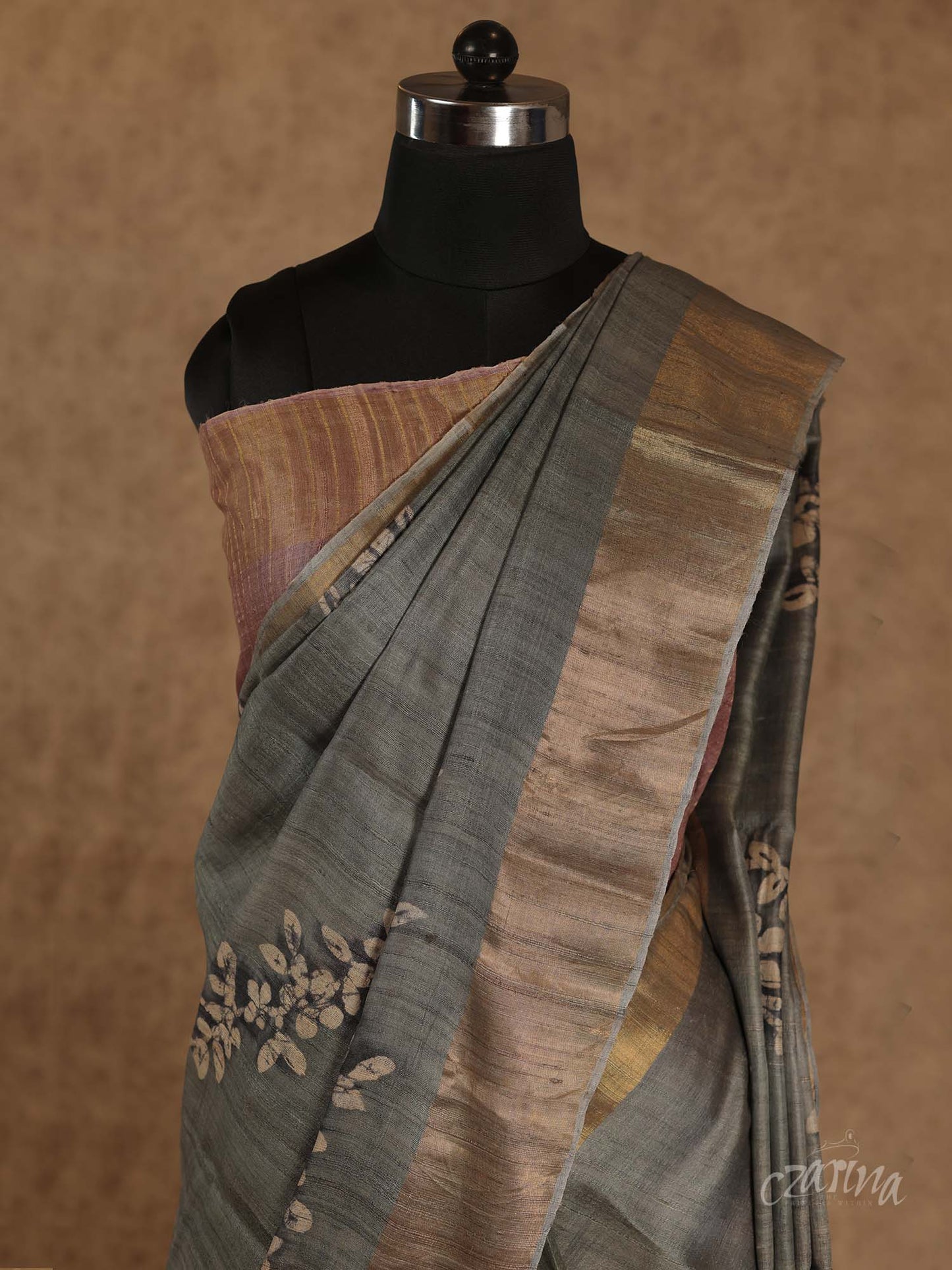 GREY WITH GOLDEN BORDER AND FLORAL PRINTS TUSSAR SILK SAREE
