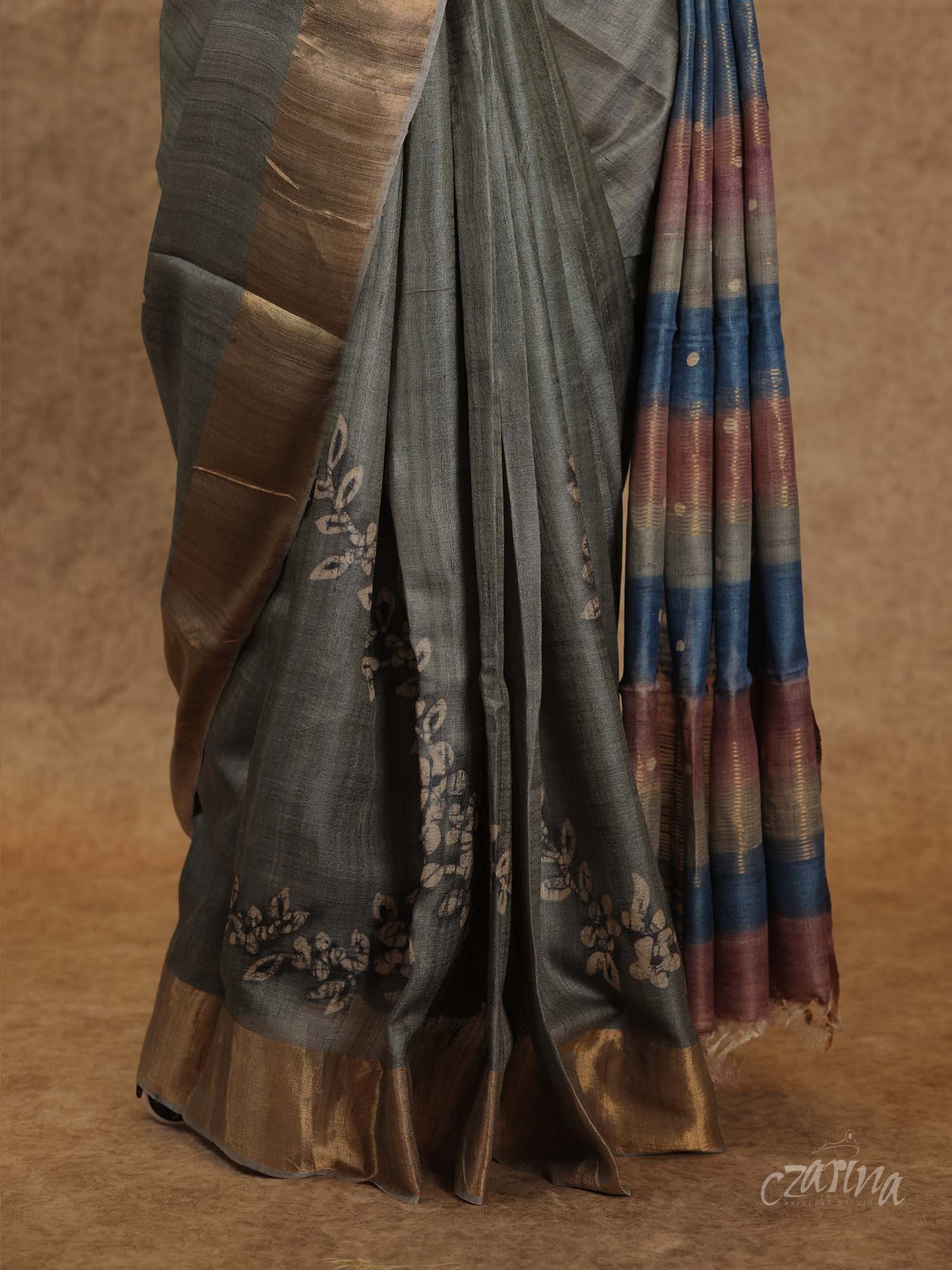GREY WITH GOLDEN BORDER AND FLORAL PRINTS TUSSAR SILK SAREE