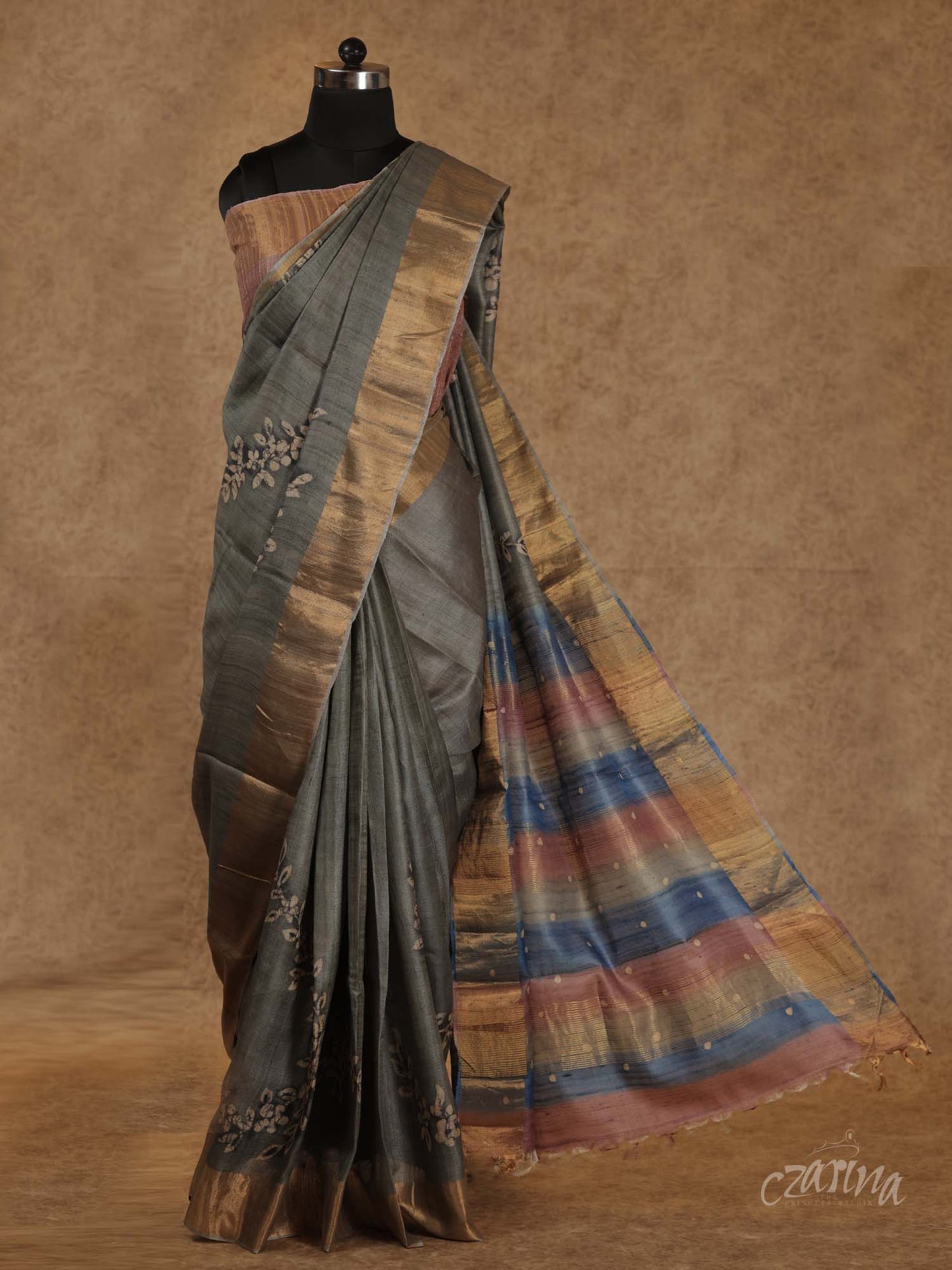 GREY WITH GOLDEN BORDER AND FLORAL PRINTS TUSSAR SILK SAREE