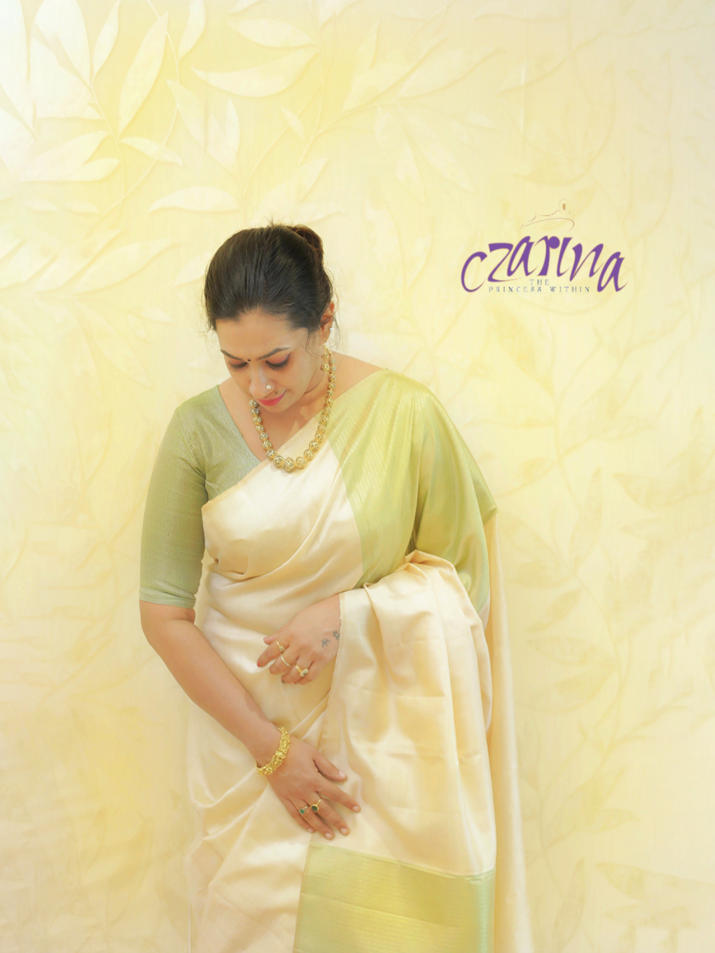 Beige and green Kanchipuram silk saree