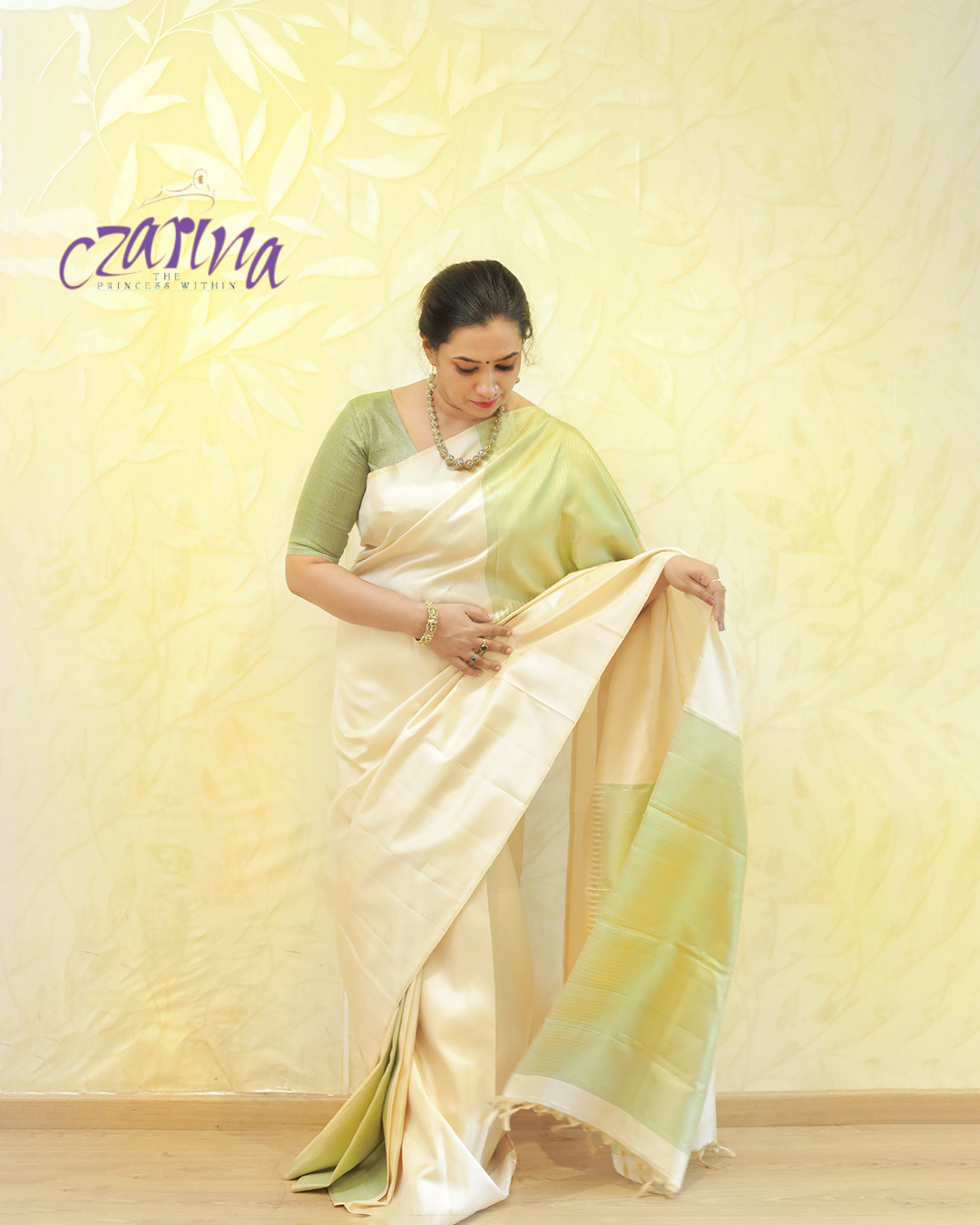 Beige and green Kanchipuram silk saree