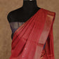 ORANGE AND GREY WITH WOVEN SEQUENCES ON BORDER TUSSAR SILK SAREE