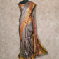 GREY AND BROWN PRINTED WITH ANTIQUE ZARI BORDER TUSSAR SILK SAREE
