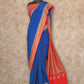 ROYAL BLUE WITH RED AND GOLD WOVEN BORDER AND PALLU CREPE SILK SAREE