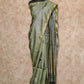 OLIVE GREEN WOVEN WITH GEOMETRIC DESIGNS IN GOLD ZARI TUSSAR SILK SAREE