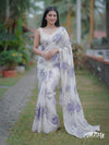 Off white pure organza saree with purple floral motifs and delicate beadwork