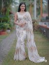 Off white pure organza saree with Dusty Peach floral motifs and delicate beadwork