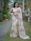 Off white organza saree with pastel lavender floral motifs and delicate beadwork