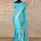 TURQUOISE BLUE WITH SILVER BORDER ORGANZA SILK SAREE