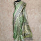 LIGHT OLIVE GREEN LIGHTWEIGHT WITH BEIGE BORDER AND GREY AND GOLD THREADWORK KANCHIPURAM SAREE