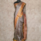 GREY AND BROWN PRINTED WITH ANTIQUE ZARI BORDER TUSSAR SILK SAREE