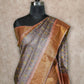GREY AND BROWN PRINTED WITH ANTIQUE ZARI BORDER TUSSAR SILK SAREE
