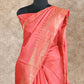 PEACHISH RED WITH STRIKING TEMPLE BORDER GOLDEN ZARI PALLU TUSSAR SILK SAREE