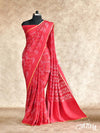 RED WITH INTRICATE BANDHINI DESIGNS CREPE SILK SAREE