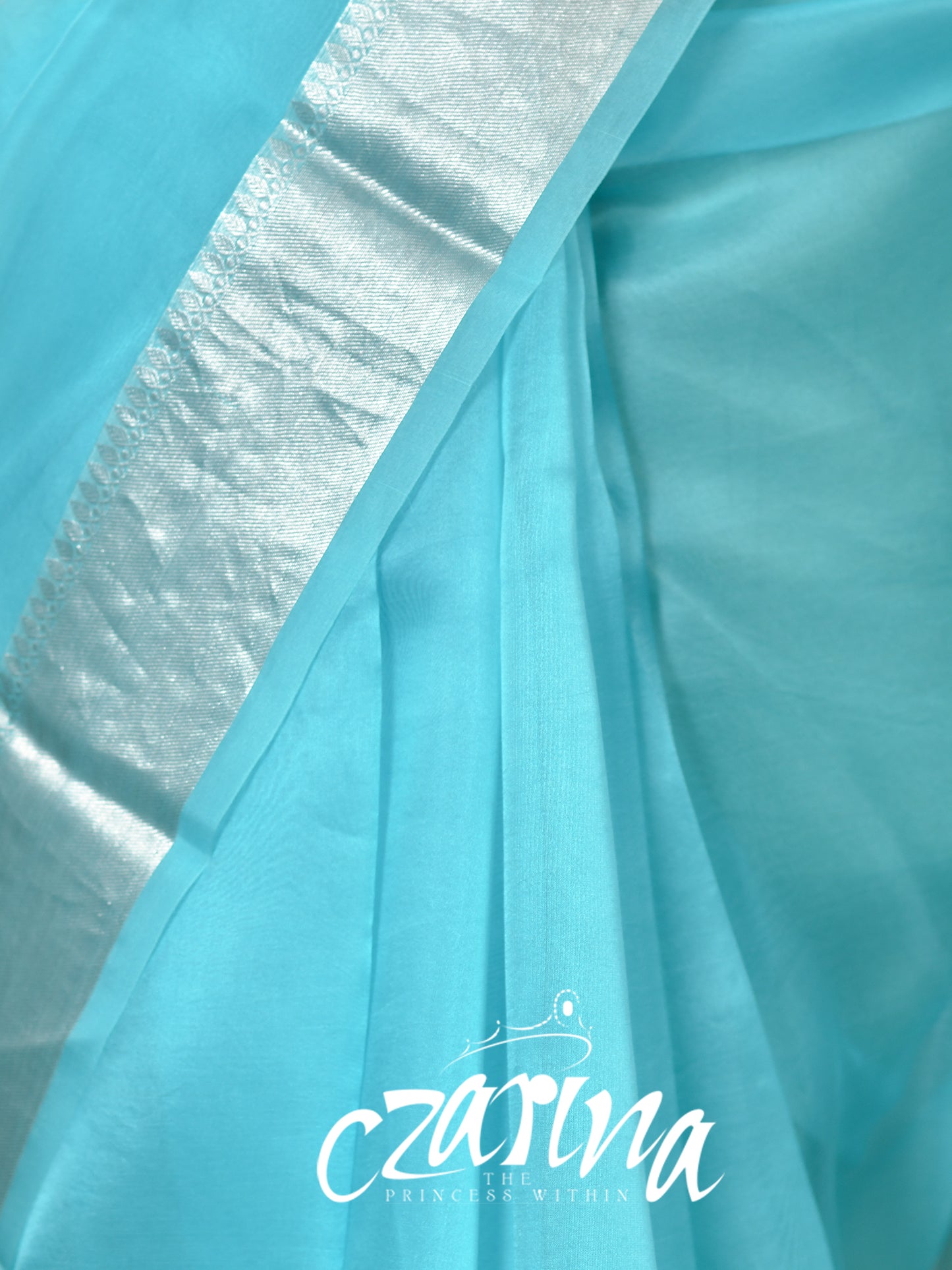 TURQUOISE BLUE WITH SILVER BORDER ORGANZA SILK SAREE