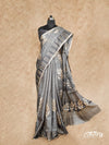 GREY PRINTED WITH WHITE LEAF DESIGNS AND EMBROIDERY HIGHLIGHTS TUSSAR SILK SAREE
