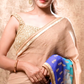 Beige, turquoise, and ink blue shaded pure georgette saree wiith golden embroidery